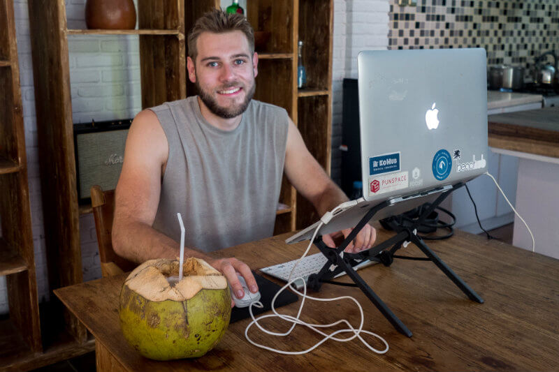 Chris the Freelancer - Location Independent on Laptop